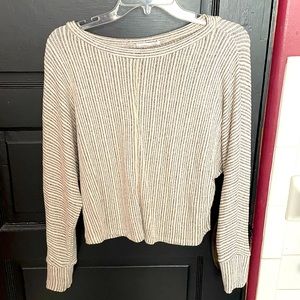 Black and white, knit, cropped long sleeve shirt